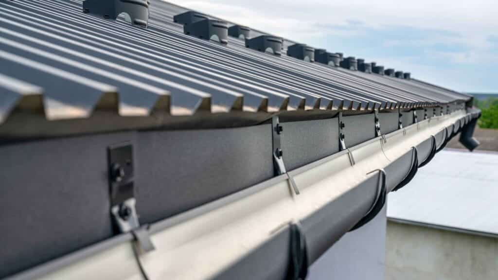 Close-up view of a clean and well-maintained house gutter system.