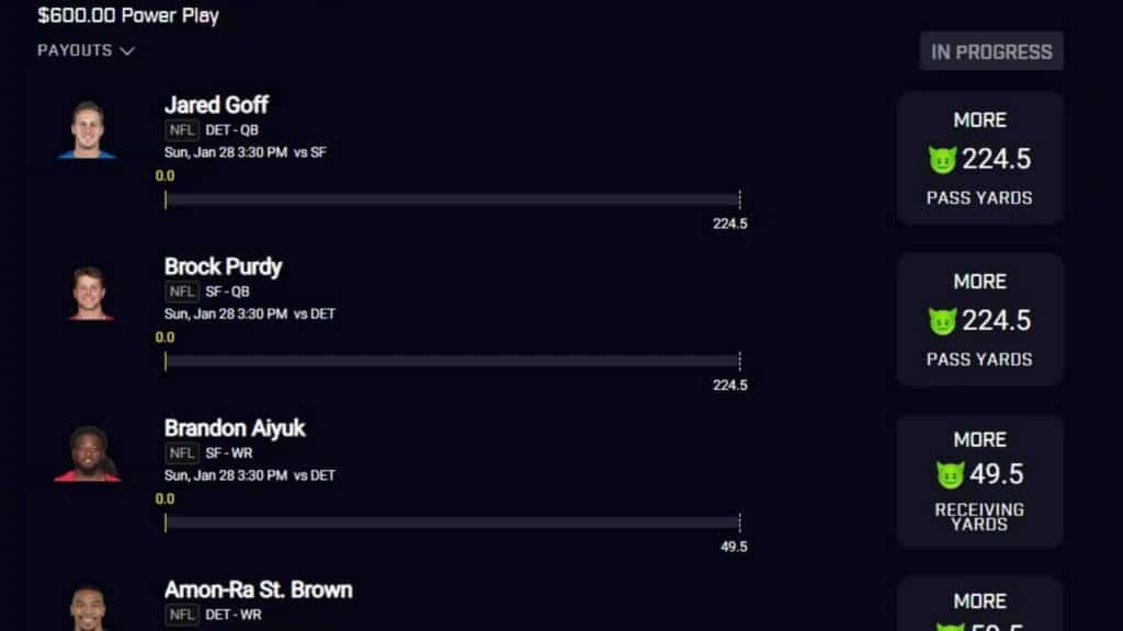 PrizePicks promo showing NFL player prop picks for passing and receiving yards.