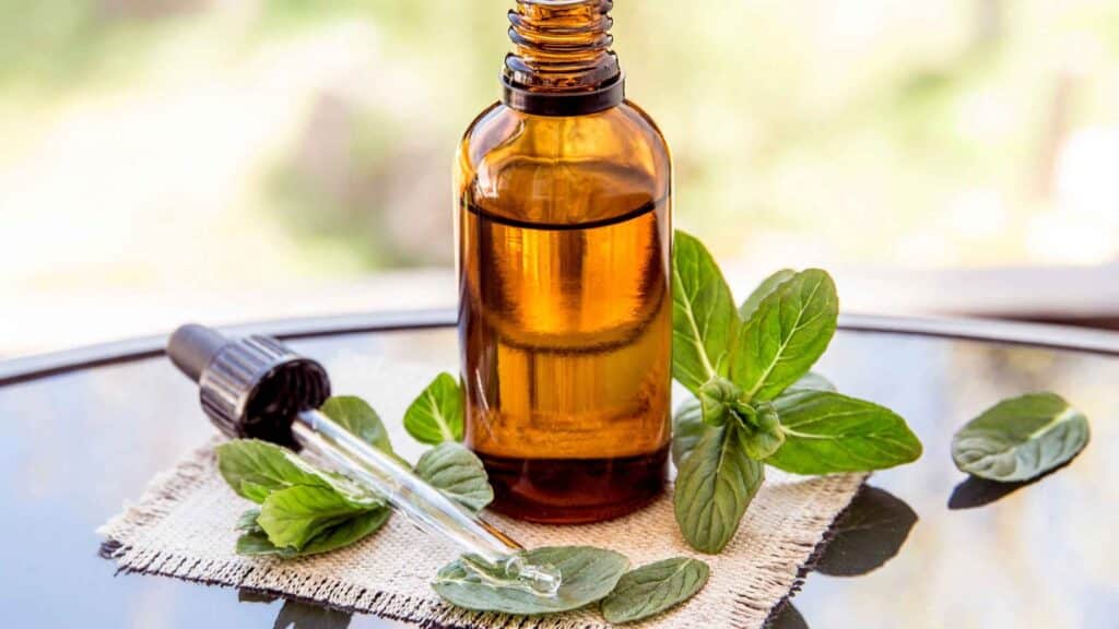 A bottle of infused oils that was handmade at home using natural spices and herbs.