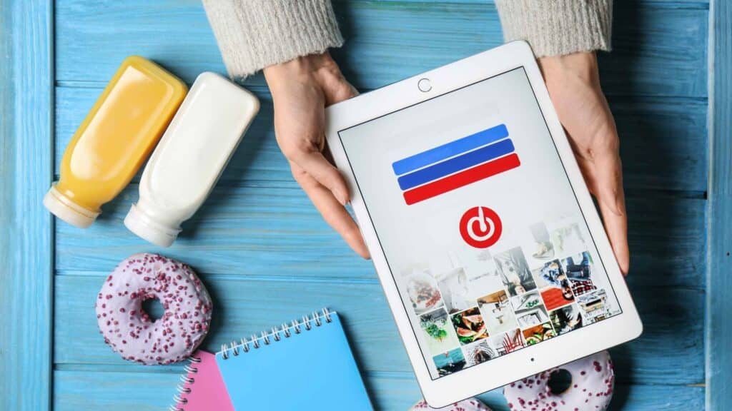 Tablet showing Pinterest app and how to generate traffic on Pinterest