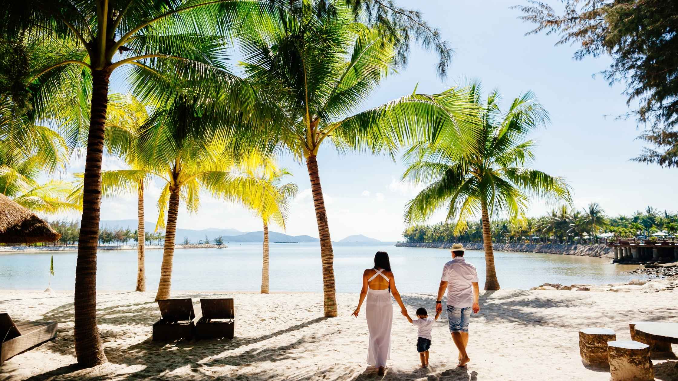 wealthy lifestyle family enjoying beach vacation
