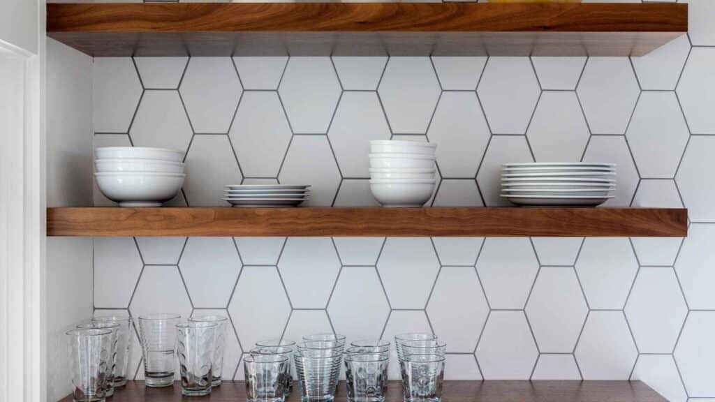 floating shelves for a DIY kitchen project that is both budget-friendly and helps save space.-