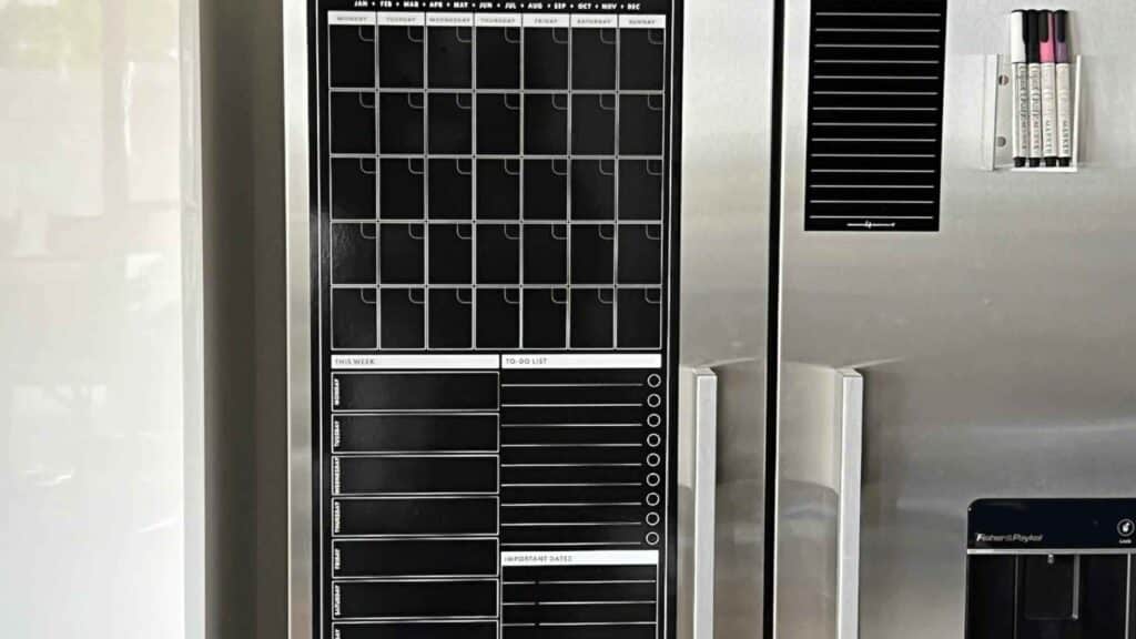 A dry erase command center for the fridge where it can be used as a calendar, notes, and helpful reminders.