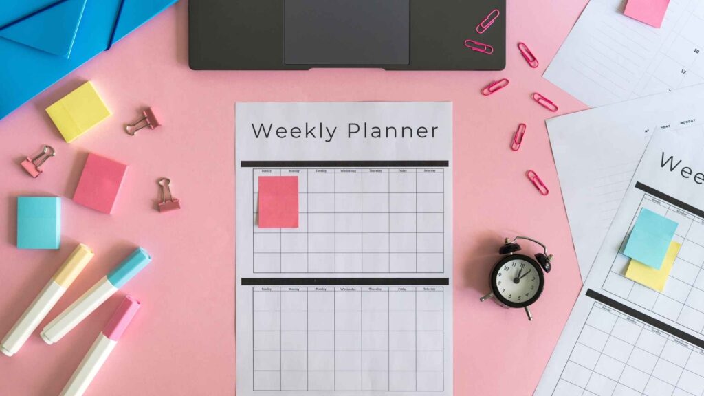Colorful weekly planner setup symbolizing the time and organization needed for successful blog monetization.